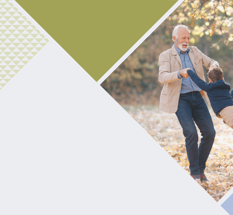 older couple dancing in the park